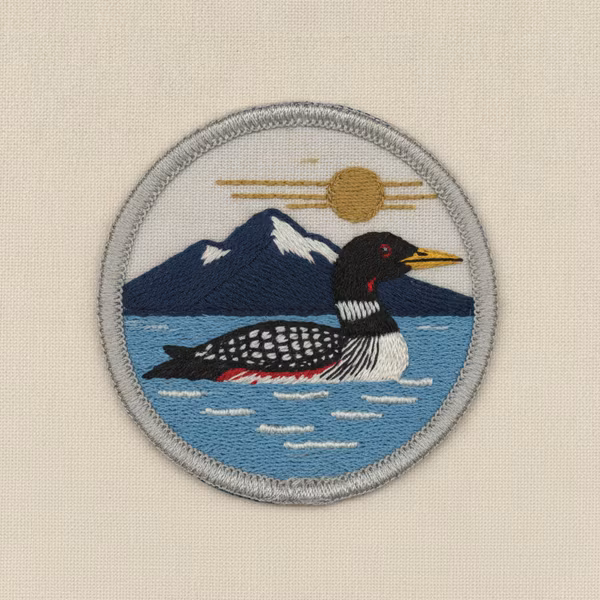 Silver plan patch with loon emblem
